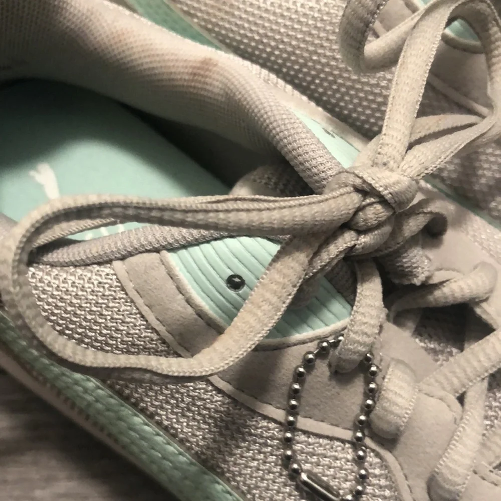 Puma retro runner sneakers in mint and light grey with soft foam support inserts
